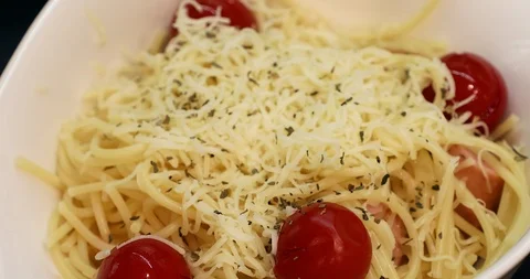 Parmesan cheese on spaghetti with tomato Stock Footage 88067989