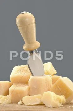 Parmesan cubes with cheese knife Stock-Fotos