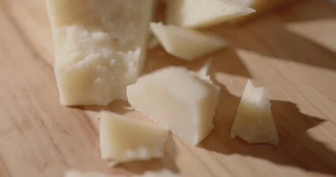 Parmesan on a cutting board Stock Footage 319946764