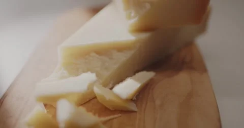 Parmesan on a cutting board Stock Footage 319946792