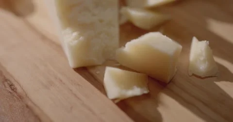Parmesan on a cutting board Stock Footage 319946793