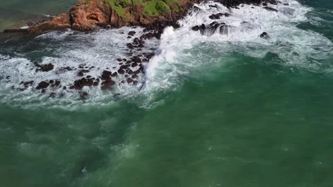 Parrot Rock Sri Lanka elevated lookout island scenic Indian Ocean waves aerial Stock Footage 300300079