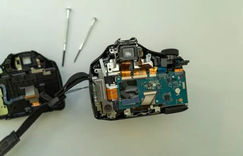 Parsing a digital camera. Digital camera in partially disassembled form Stock Photos