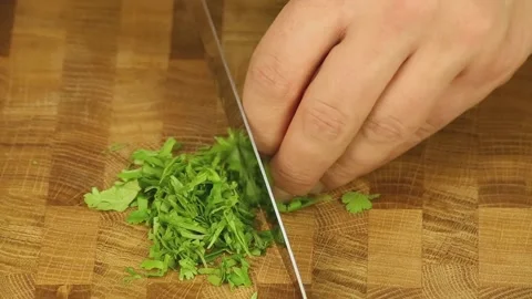 Parsley cut with a sharp knife Stock Footage 192087676