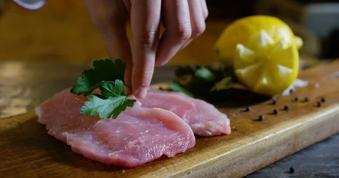 Parsley on raw meat 4k Stock Footage 85836047