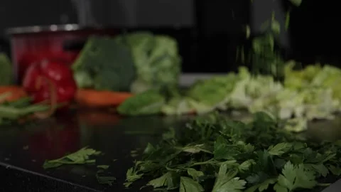 Parsley scattered on the table with vegetables 스톡 동영상 137211301