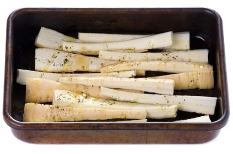 Parsnips prepared for roasting Stock Photos