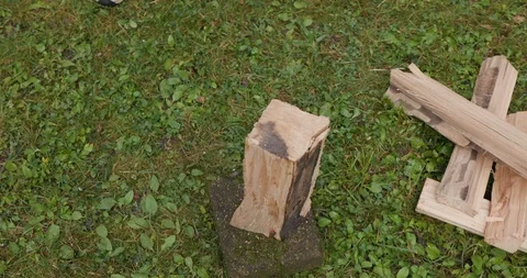 Parson Chopping Wood with Axe for Fire Pit 動画素材 111983397