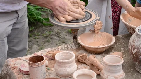 Part 1. Teaching how to make pottery on potter's wheel Stock Footage 50349281