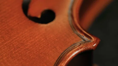 Part of aged violin on black background Stock-Footage 73001937