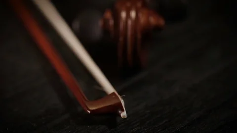 Part of aged violin on black background Stock Footage 73002111