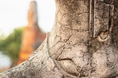 Part of an ancient Buddha statue. Stock Photos