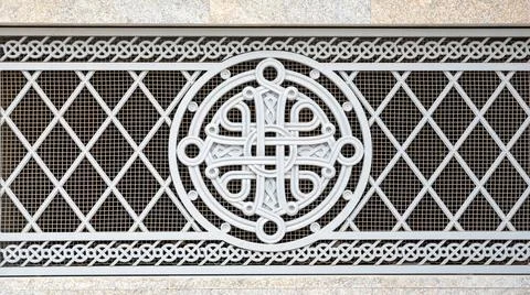 Part of an antique stone structure and a fragment of the classical decorat... Stock Photos