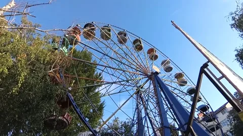 Part of attractions. Ferris wheel in summer on a sunny day Stock Footage 145686757