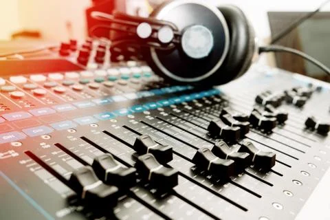 Part of an audio sound mixer with buttons and sliders Stock Photos