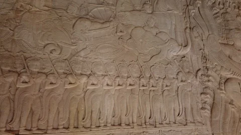Part of the bas-relief in the ancient temple of Angkor Wat, "buttermilk ocean." Stock Footage 106102998