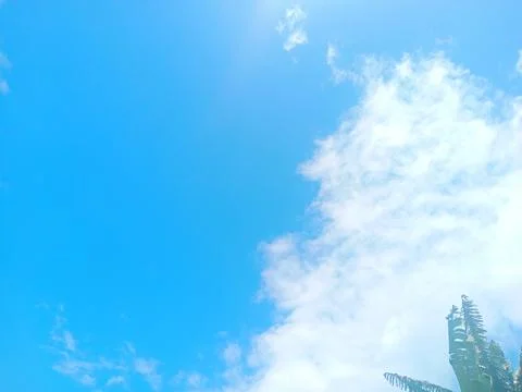 Part of the blue sky is covered by clouds Stock Photos