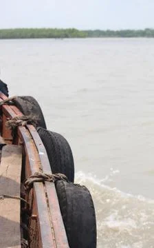 A part of the boat in the river Stock Photos