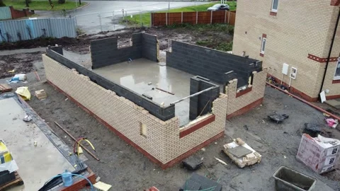 Part built house from a construction site in the UK Stock Footage 228805045