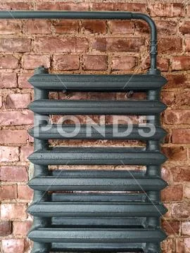 Photograph: A part of a Cast-iron water heating battery, radiator on ...