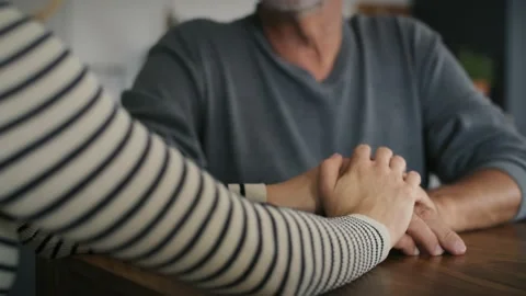 Part of caucasian woman's hands support his father Stock Footage 218717541