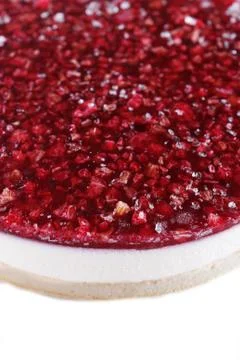 Part of cheesecake with raspberry on a plate Stock Photos