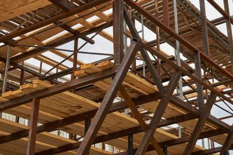 Part of the construction of a building object made of metal and wood Stock Photos