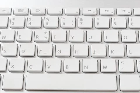 A part of desktop computer keyboard is a white color Stock Photos