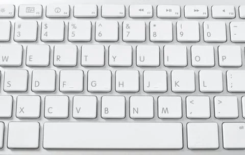 A part of desktop computer keyboard is a white color Stock Photos
