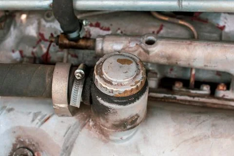Part of the engine of an old tractor. Machine technology Stock Photos