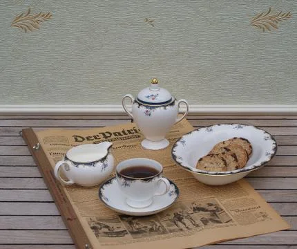 A part of an english tea set on an old German daily newspaper Der Patriot Stock Photos