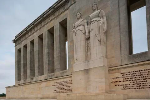 Part of the facade with statues. Stock Photos