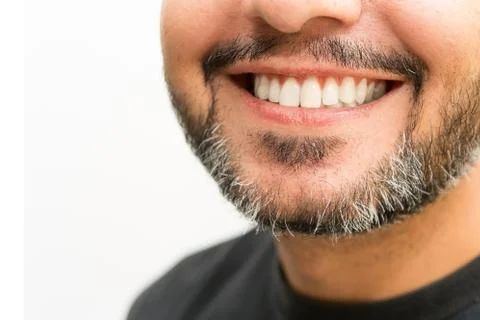 Part of the face of a bearded man Stock Photos