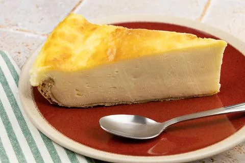Part of flan on plate Stock Photos