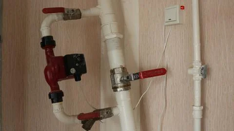 Part of the gas heating system in the technical room Stock Photos