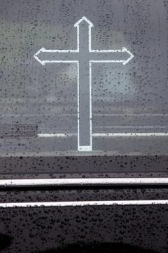 Part of hearse with cross Stock Photos