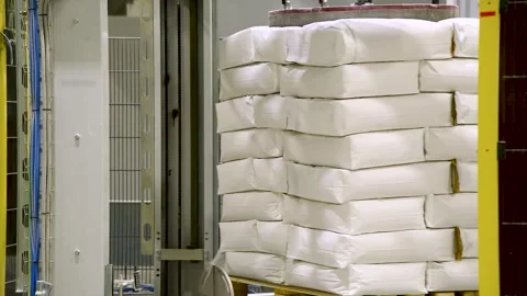 A part of an industrial machine or conveyor system used to pack bulk materi.. Видео 331206947