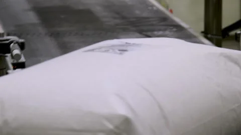 A part of an industrial machine or conveyor system used to pack bulk materi.. Видео 339764982