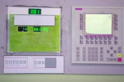 Part of an industrial machine with program control with command buttons. Stock Photos