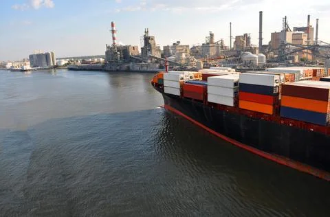 Part of large merchant ship container vessel in coastal waters of ocean. A me Stock-Fotos