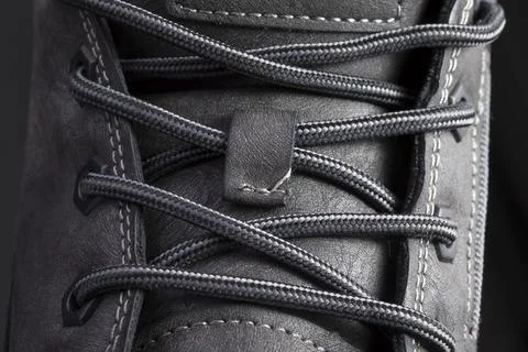 Part of a leather boot close-up. A fragment of the texture of leather shoes Stock Photos