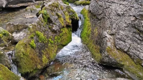 Part of long cascading waterfall descending from mountains, close up. Stock Footage 166248825