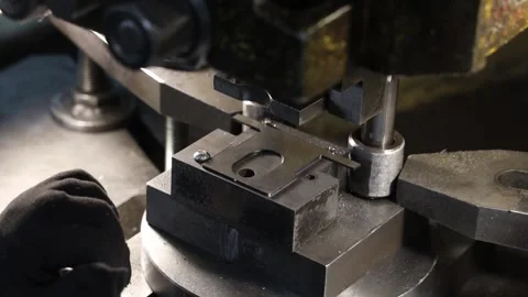 A part is made on a stamping machine Stock Footage 340518198