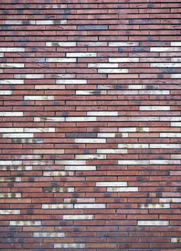 Part of modern multi colored brick wall Stock Photos