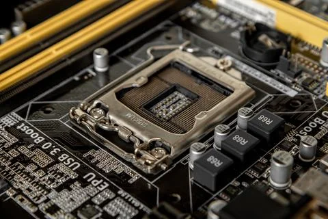 Part of the motherboard with a processor socket and other connectors to accom Stock Photos