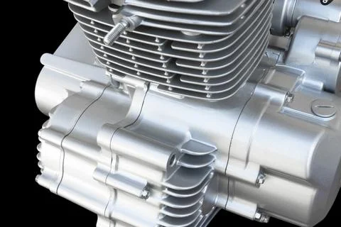 Part of motorcycle engine isolated on black background. Air cooled internal.. Stock Photos