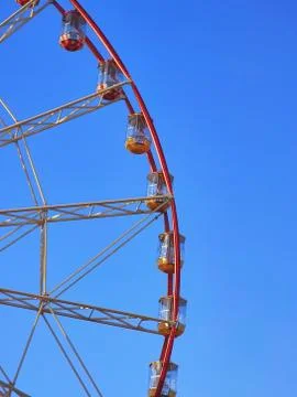 Part of observation wheel with few empty cabins Stock Photos