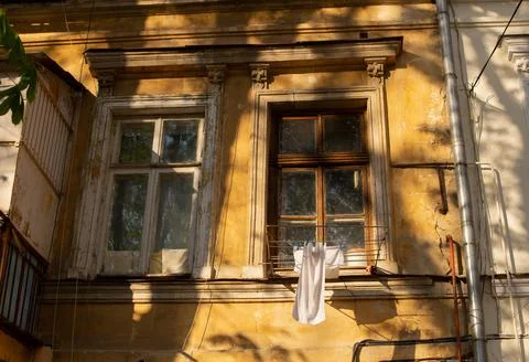 A part of old building facade of typical houses in Odessa old town city cente Stock Photos