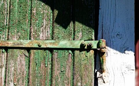 Part of an old door with hinges Stock Photos