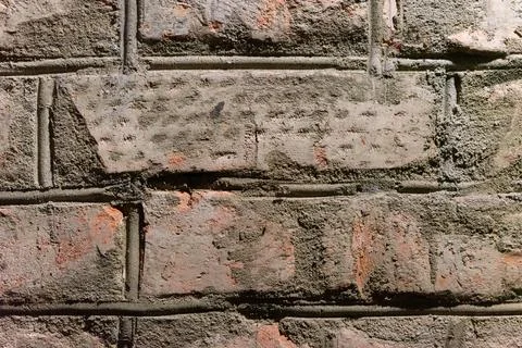 Part of an old red brick wall close-up Stock Photos